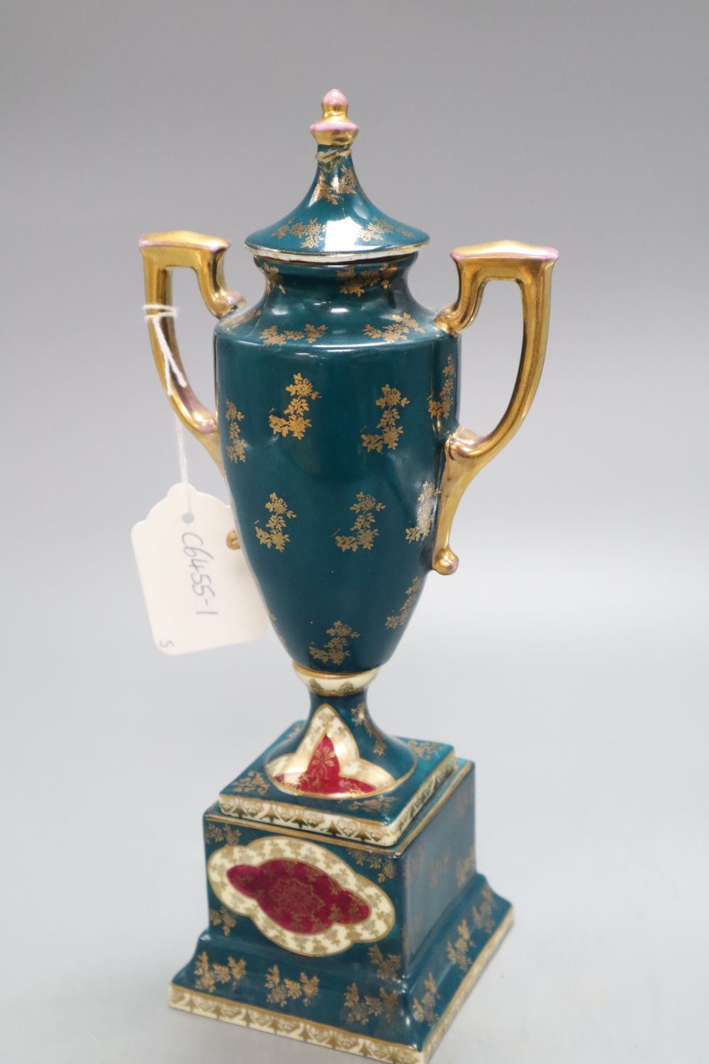 A pair of Doulton Slaters patent stoneware vases, Continental figures and a Vienna style urn and cover, tallest 28cm